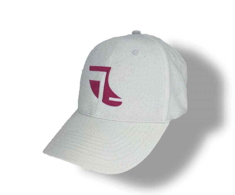 Angled image of White ShoreTees Baseball Cap with Pink embroidered Fin Logo