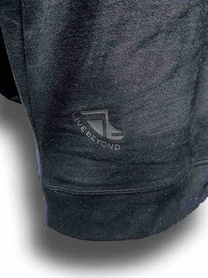 Close up image of Balance Collection Premium Black Hoodies Black rear silicone detail